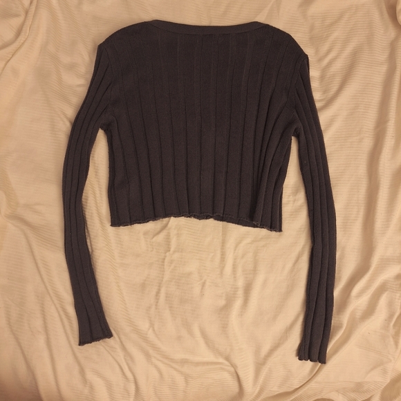 A button-up sweater. - Picture 2 of 2